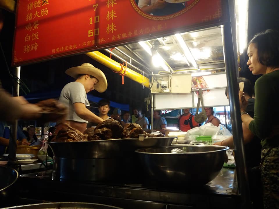 Cowboy hat lady serving stewed pork in Chiang Mai