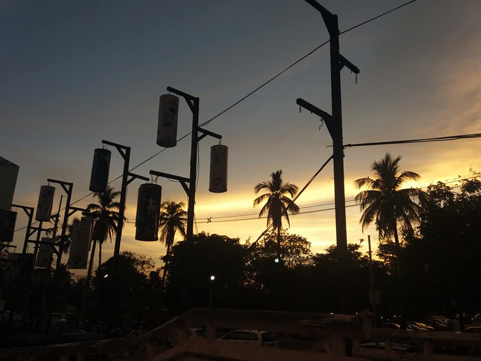 Sunset over Khon Kaen park.