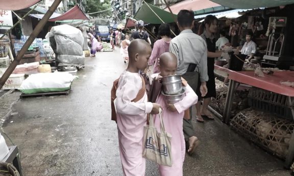Monks asking for alms in the local market