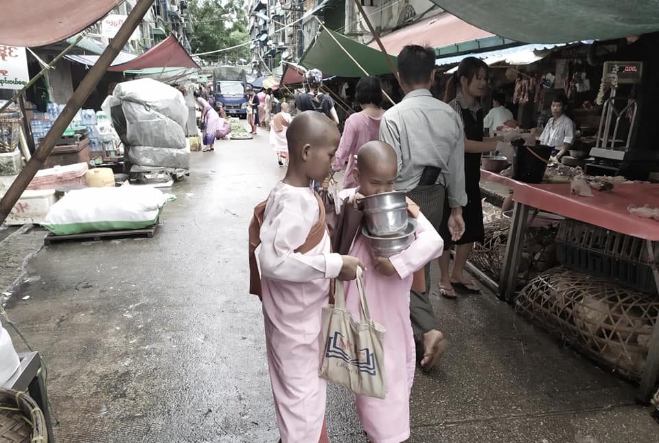 Monks asking for alms in the local market