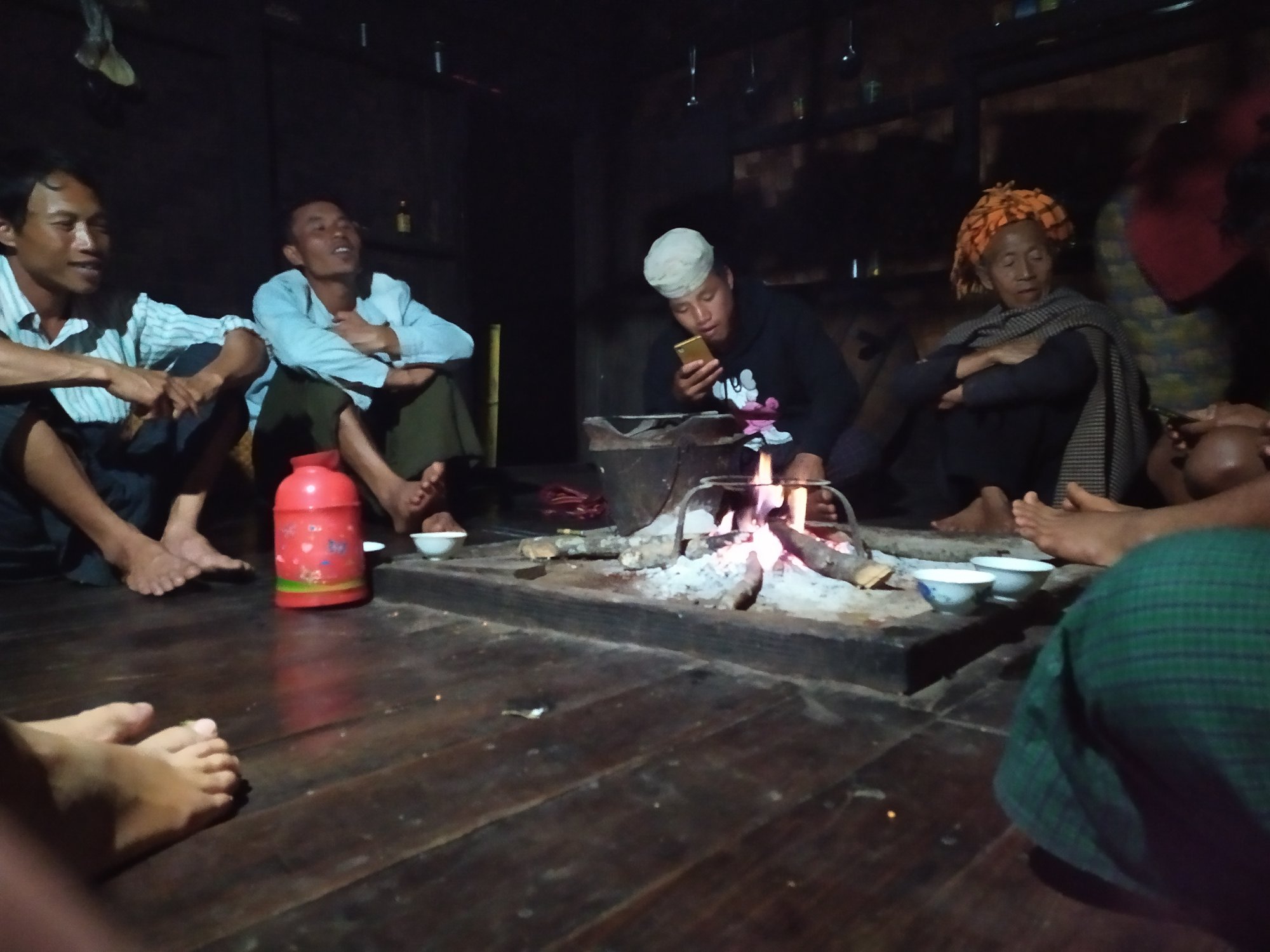 Sitting around the kitchen fire with our hosts